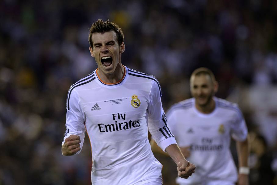 Un gioiello di Bale decide la finale di Coppa del Re. Il Real affonda il Barcellona 2-1, dopo essere passato in vantaggio con Di Maria e aver subito il pareggio di testa di Bartra. Afp
